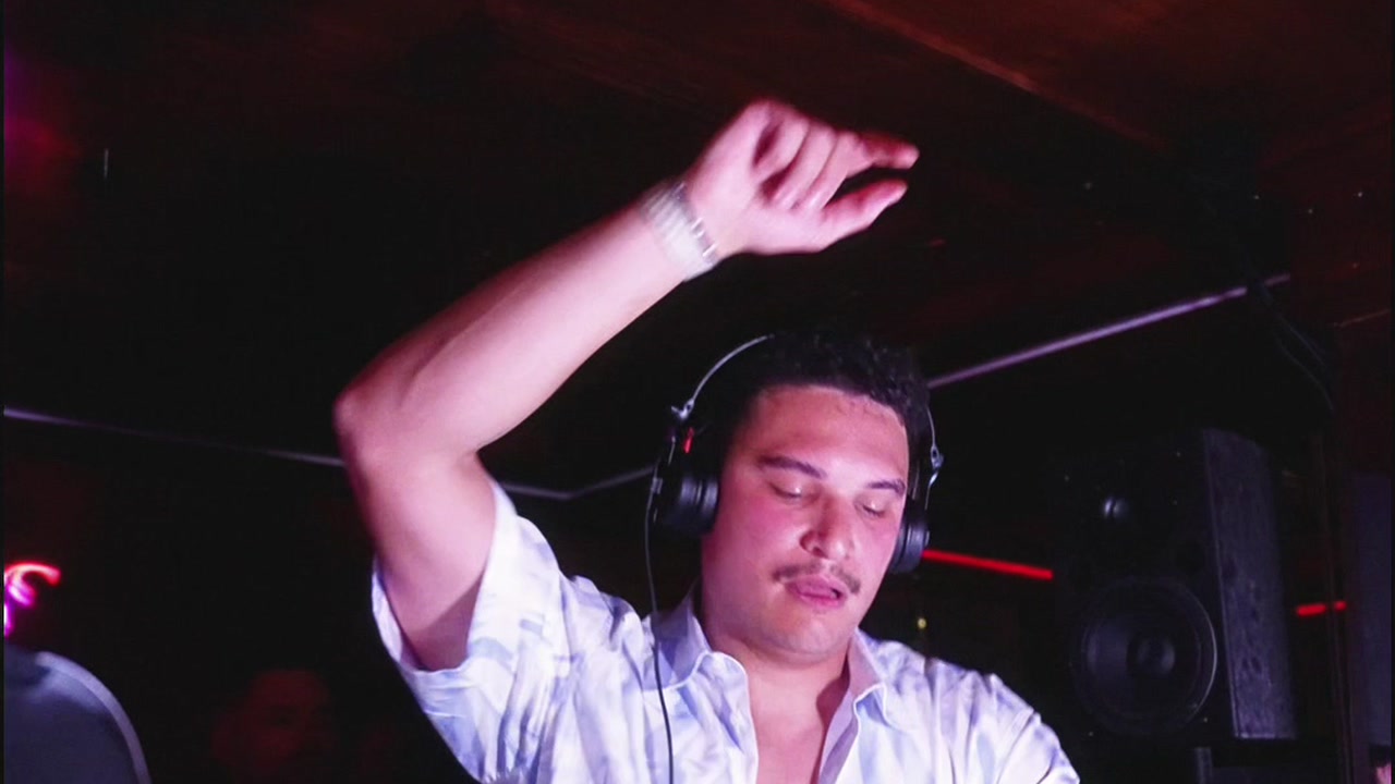 Warren Will performing behind the decks